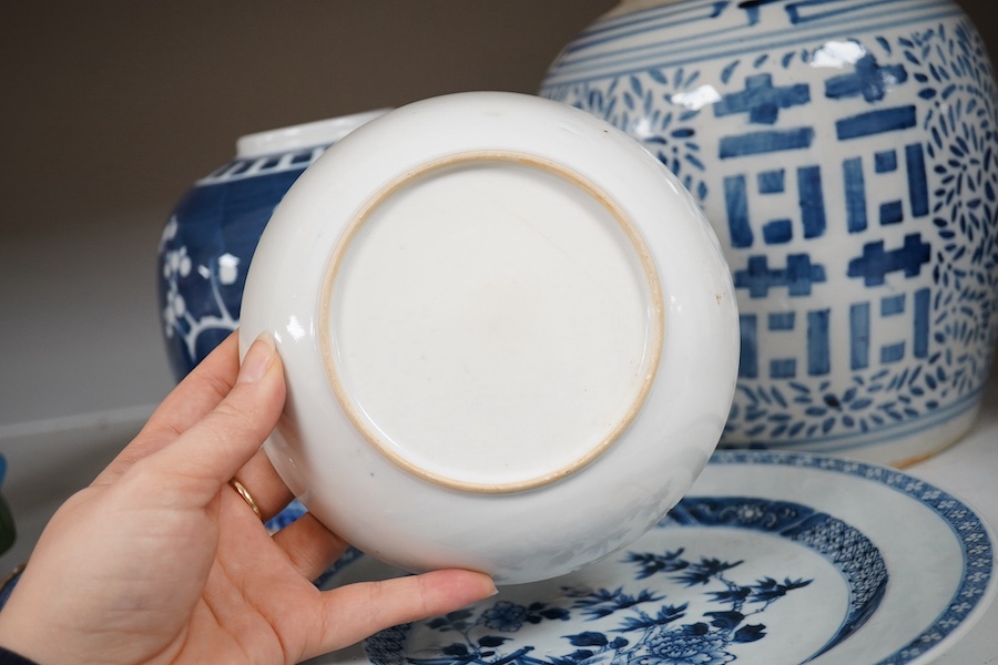 An 18th century Chinese export blue and white plate, together with two other dishes and two ginger jars. Condition - varies